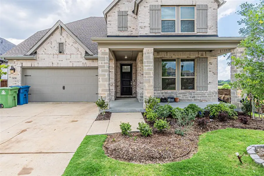 Exterior details and patio area of a home in , Aubrey (Image 3).