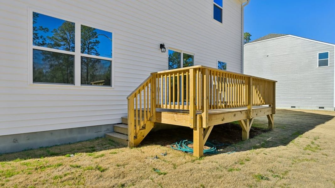Exterior details and patio area of a home in Gretchen Pines, West End (Image 4).