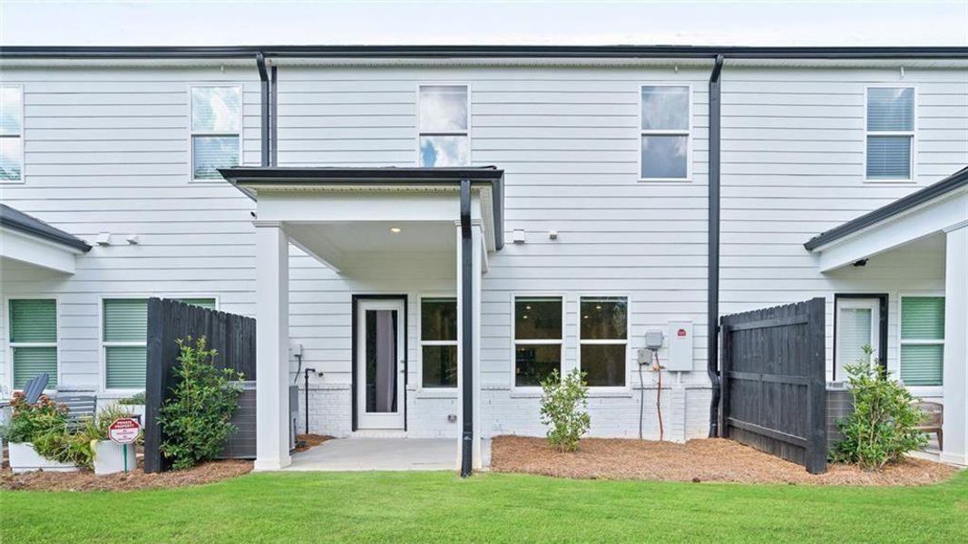 Exterior details and patio area of a home in Terrace at Riverview Landing, Smyrna (Image 4).