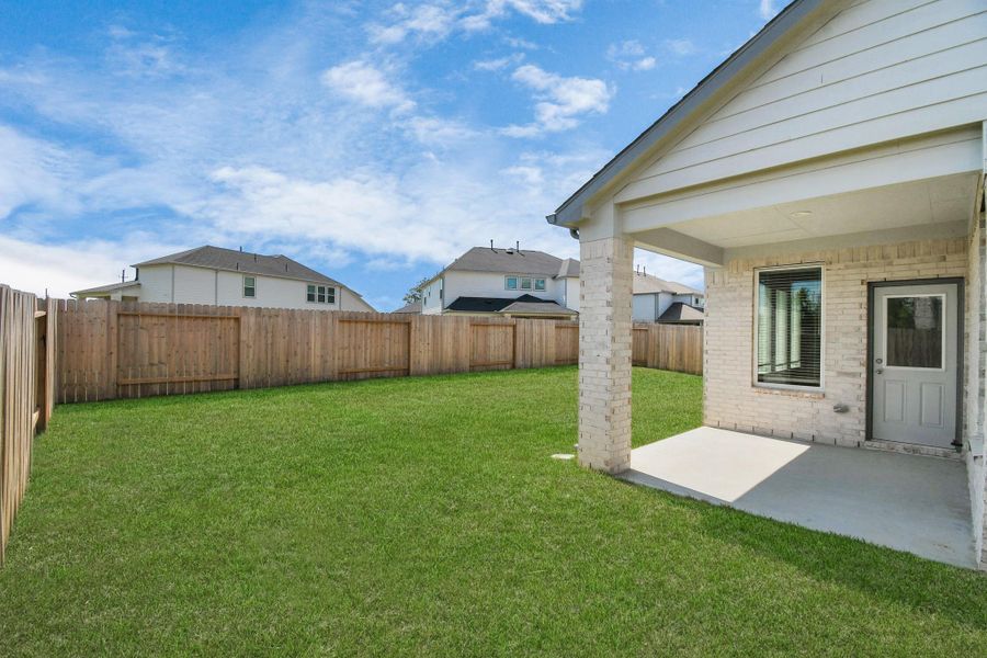 Experience outdoor living at its finest on this expansive covered patio, thoughtfully designed for BBQs and delightful outdoor dining. Experience outdoor living at its finest on this expansive covered patio, thoughtfully designed for BBQs and delightful outdoor dining.