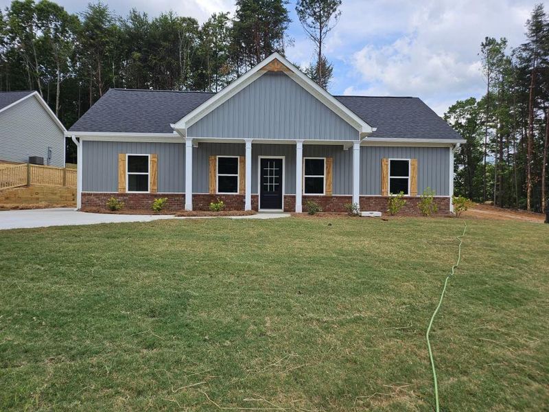 Front exterior of a new home in , Rockmart, GA, highlighting curb appeal (Image 1). Front exterior of a new home in , Rockmart, GA, highlighting curb appeal (Image 1).