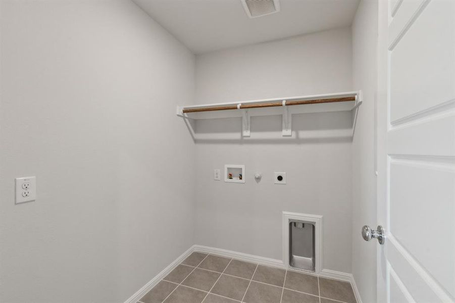 Utility Room in the Hayden home plan by Trophy Signature Homes – REPRESENTATIVE PHOTO Utility Room in the Hayden home plan by Trophy Signature Homes – REPRESENTATIVE PHOTO