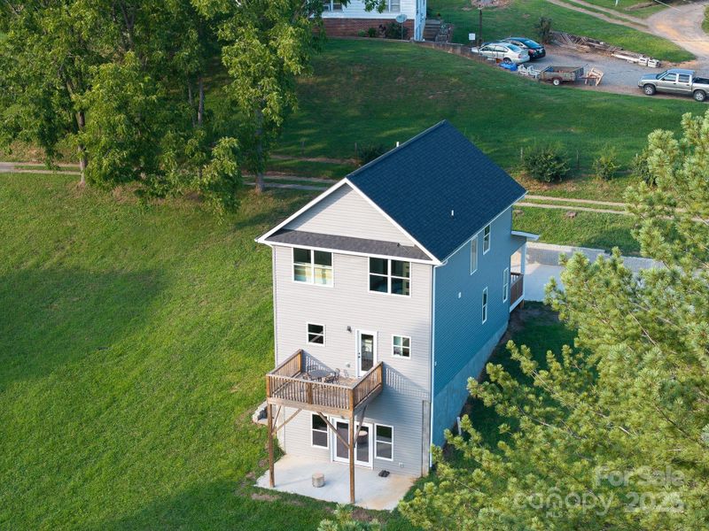 Front exterior of a new home in , Asheville, NC, highlighting curb appeal (Image 25).