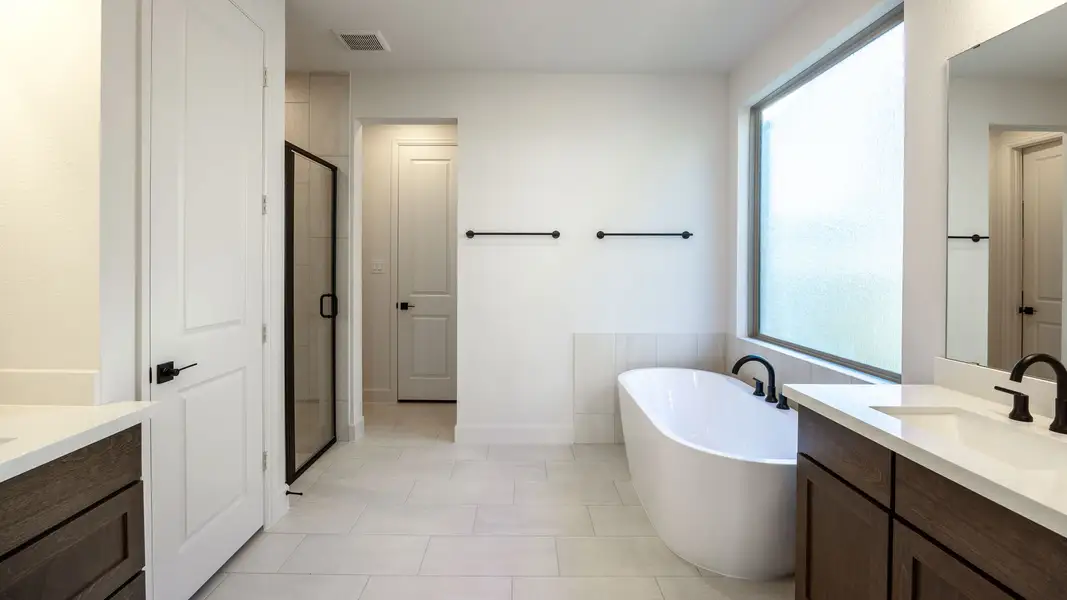 Furnished interior view inside a new home in Wolf Ranch 56', Georgetown (Image 5).