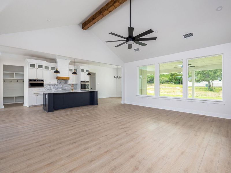 Large Family Room looking into the Kitchen Large Family Room looking into the Kitchen