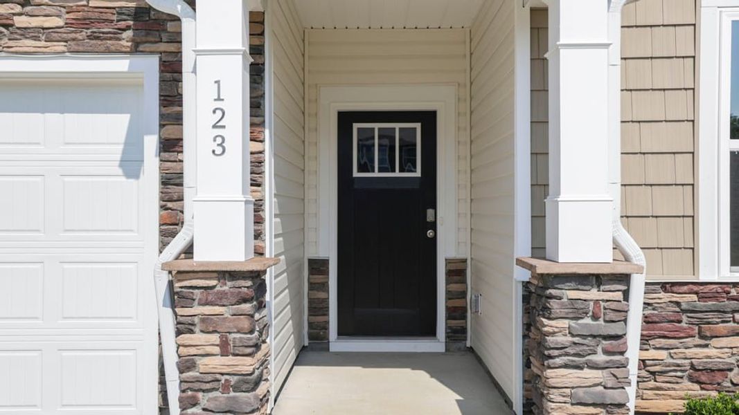 Exterior details and patio area of a home in Waverly Station, Greenwood (Image 3). Exterior details and patio area of a home in Waverly Station, Greenwood (Image 3).