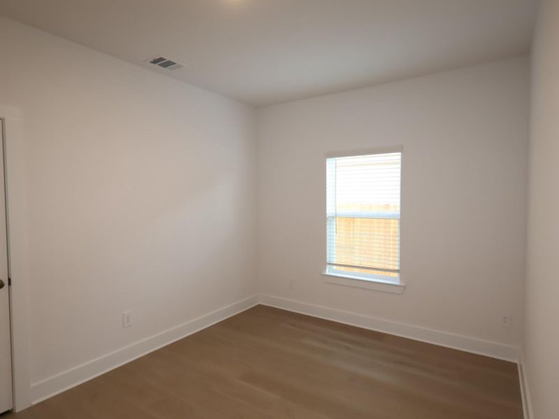 Spacious, unfurnished interior of a new home in Sorella, Tomball (Image 6).