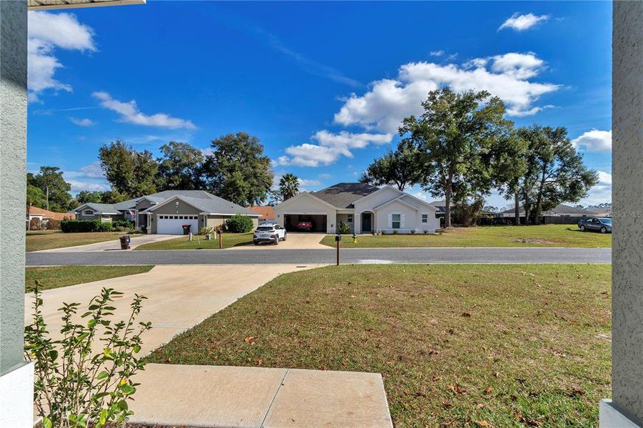 Front exterior of a new home in Diamond Ridge, Belleview, FL, highlighting curb appeal (Image 20).