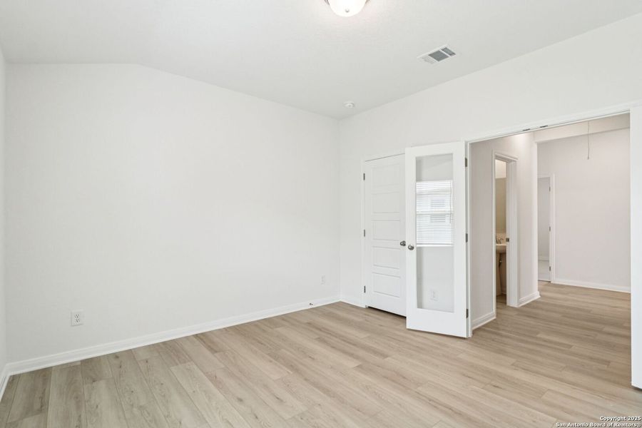 Spacious, unfurnished interior of a new home in Legendary Trails - Classic Series, Cibolo (Image 35).