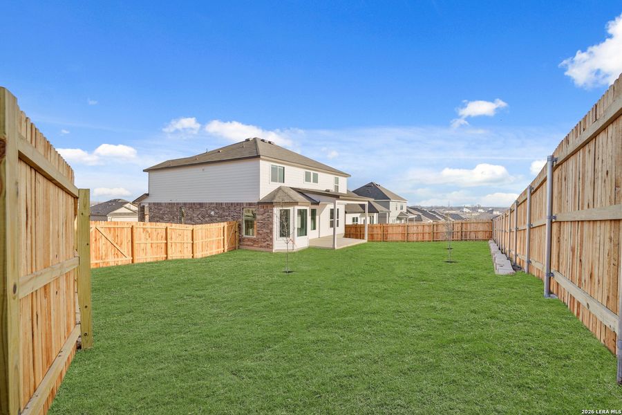 Exterior details and patio area of a home in Cinco Lakes, San Antonio (Image 3).