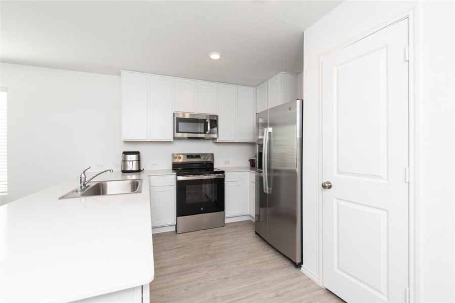 Furnished interior view inside a new home in Cielo Gardens: Welton Collection, Jarrell (Image 3). Furnished interior view inside a new home in Cielo Gardens: Welton Collection, Jarrell (Image 3).
