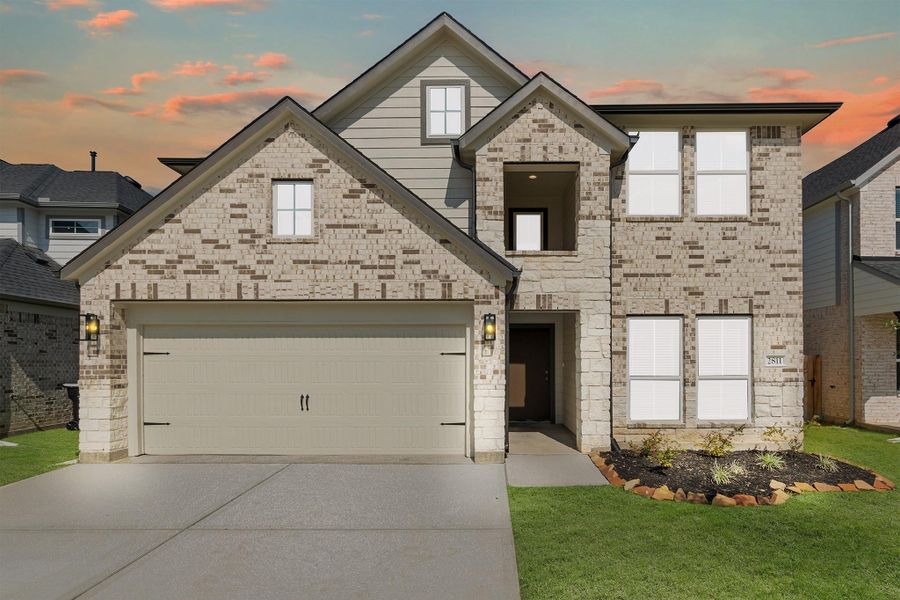 Front exterior of a new home in Morton Creek Ranch, Katy, TX, highlighting curb appeal (Image 2). Front exterior of a new home in Morton Creek Ranch, Katy, TX, highlighting curb appeal (Image 2).