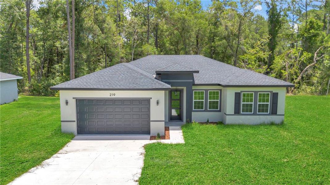 Front exterior of a new home in , Dunnellon, FL, highlighting curb appeal (Image 20). Front exterior of a new home in , Dunnellon, FL, highlighting curb appeal (Image 20).