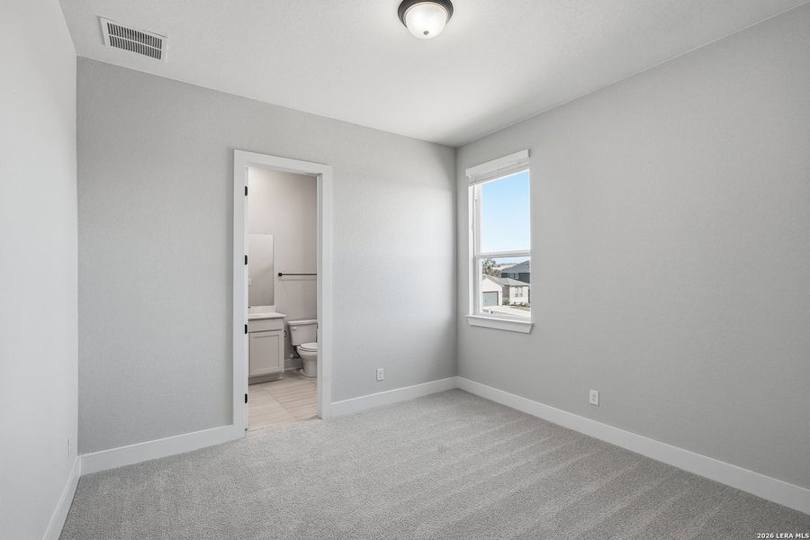 Spacious, unfurnished interior of a new home in Potranco Oaks, Castroville (Image 29).