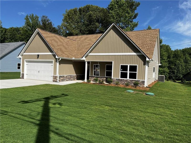 Front exterior of a new home in , Hiram, GA, highlighting curb appeal (Image 16).