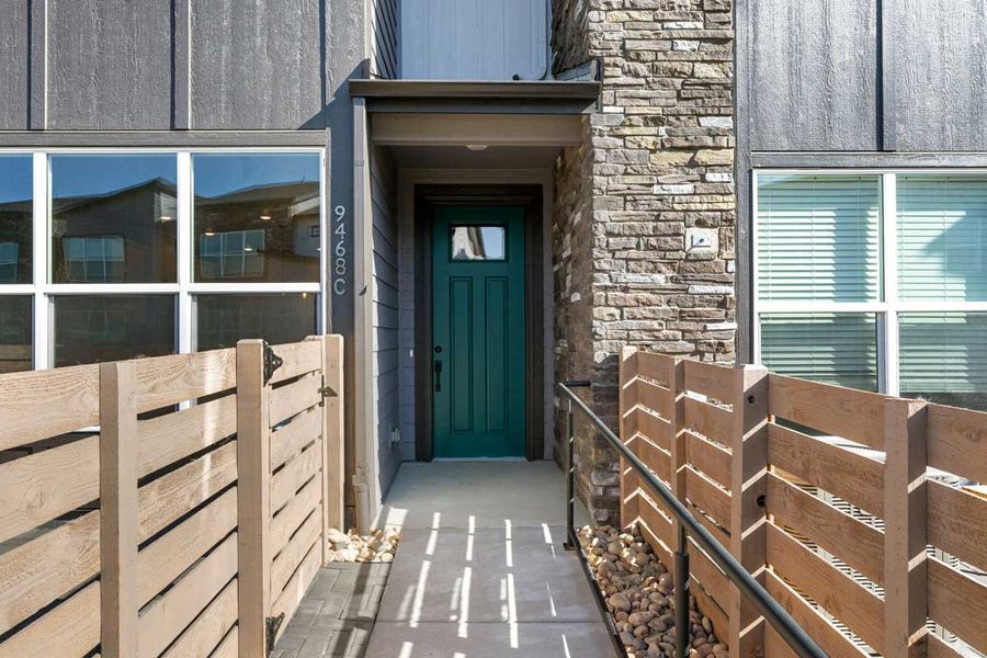Front exterior of a new home in Ralston Creek, Arvada, CO, highlighting curb appeal (Image 3).