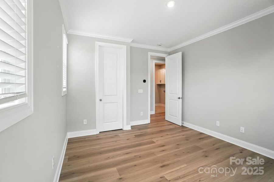 1st Floor BR 3 with Walk in Closet- represented home has same options