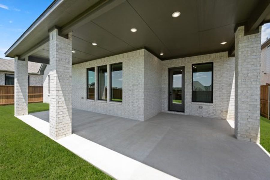 Exterior details and patio area of a home in Rio Vista at Kelly Ranch, Aledo (Image 4). Exterior details and patio area of a home in Rio Vista at Kelly Ranch, Aledo (Image 4).
