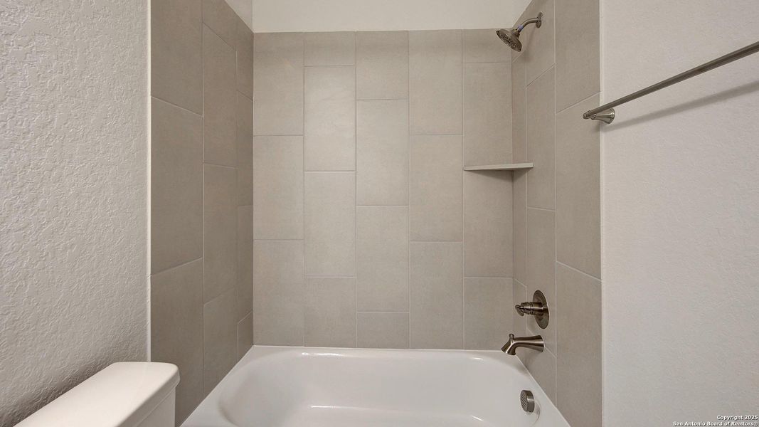 Furnished interior view inside a new home in Stevens Ranch 55', San Antonio (Image 5).