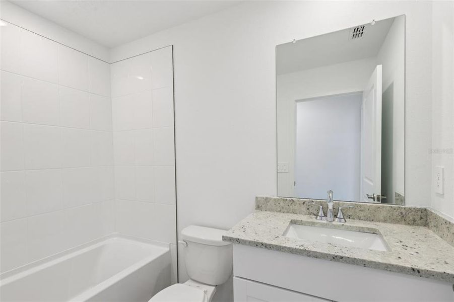 Furnished interior view inside a new home in Colbert Landings, Palm Coast (Image 8).