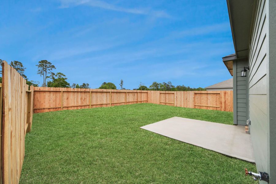 Exterior details and patio area of a home in The Enclave at Spring Branch, Montgomery (Image 16). Exterior details and patio area of a home in The Enclave at Spring Branch, Montgomery (Image 16).