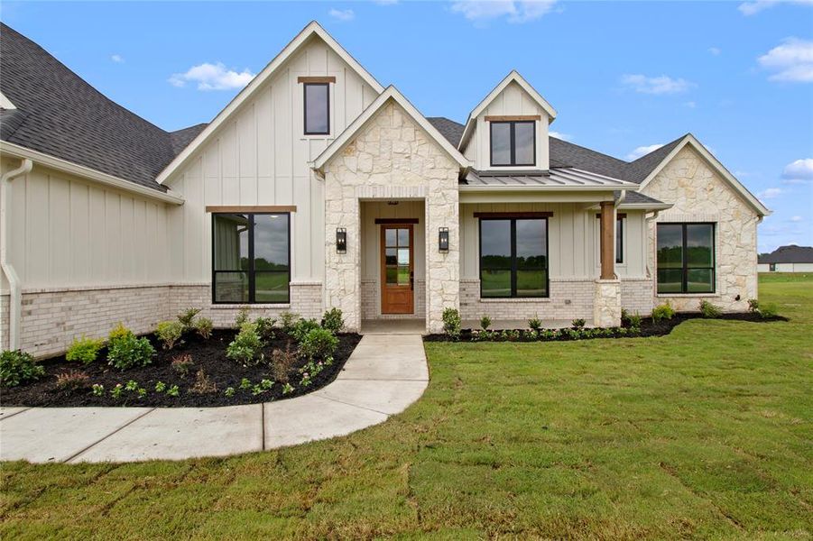 Front exterior of a new home in , Waxahachie, TX, highlighting curb appeal (Image 22).