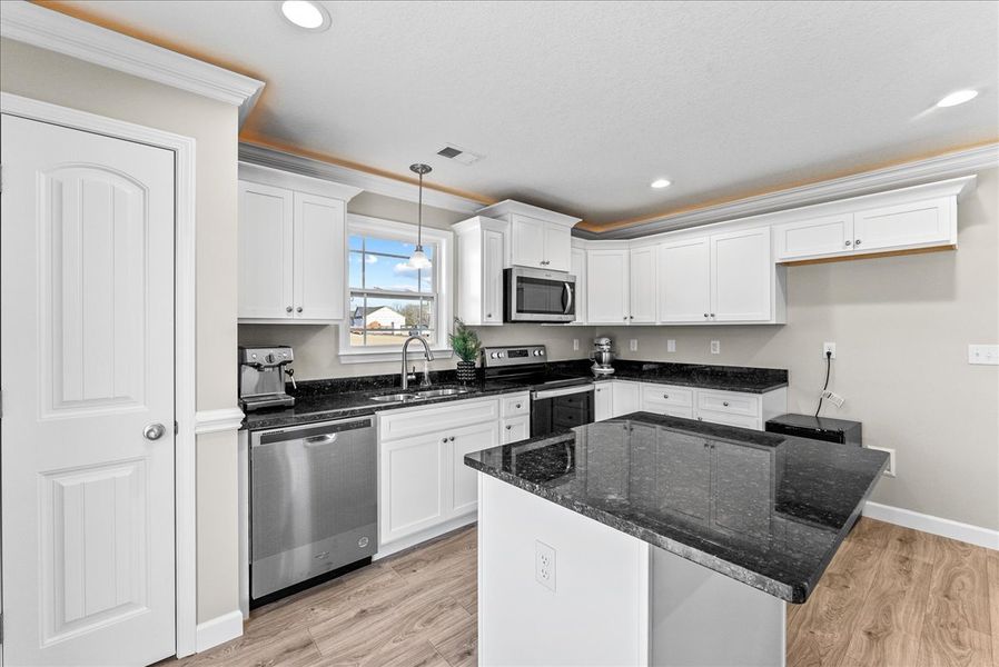 Representative furnished interior of a home built from the Sumter by Enchanted Homes in Ballentine Ridge, Lyman (Image 37).