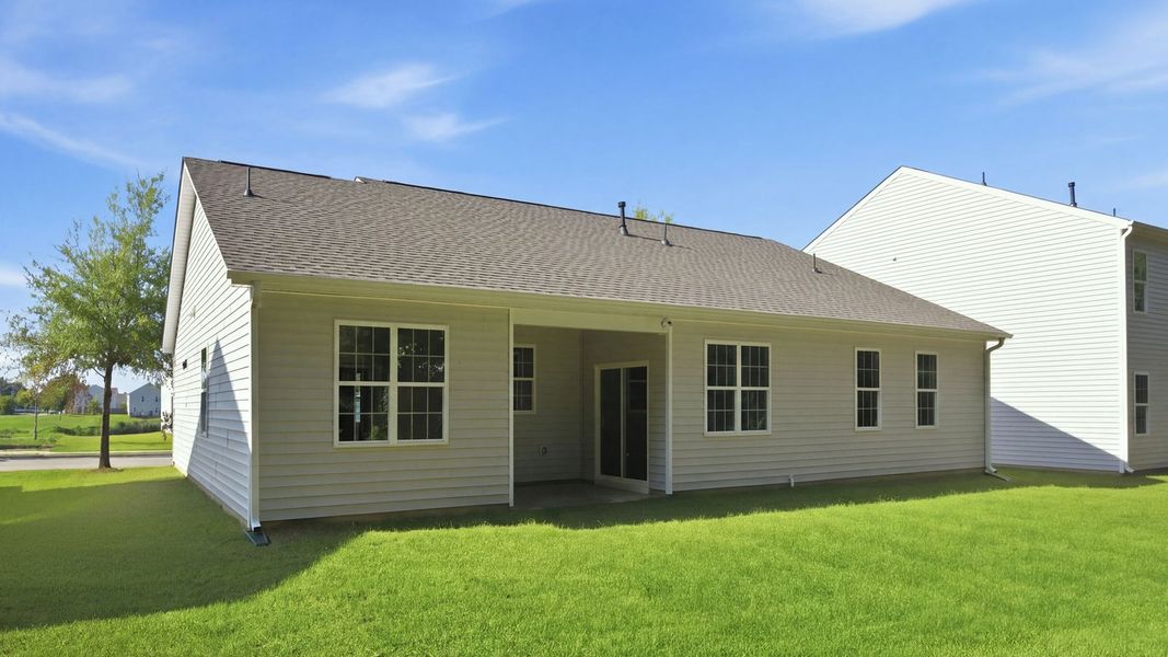Exterior details and patio area of a home in Tyler - Home on the Lake, New Bern (Image 4).