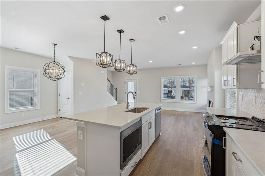 Furnished interior view inside a new home in Hemingway - Cottage Series, Cumming (Image 4).