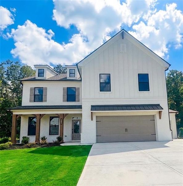 Front exterior of a new home in Rosewood Lake Estates, Hoschton, GA, highlighting curb appeal (Image 21).