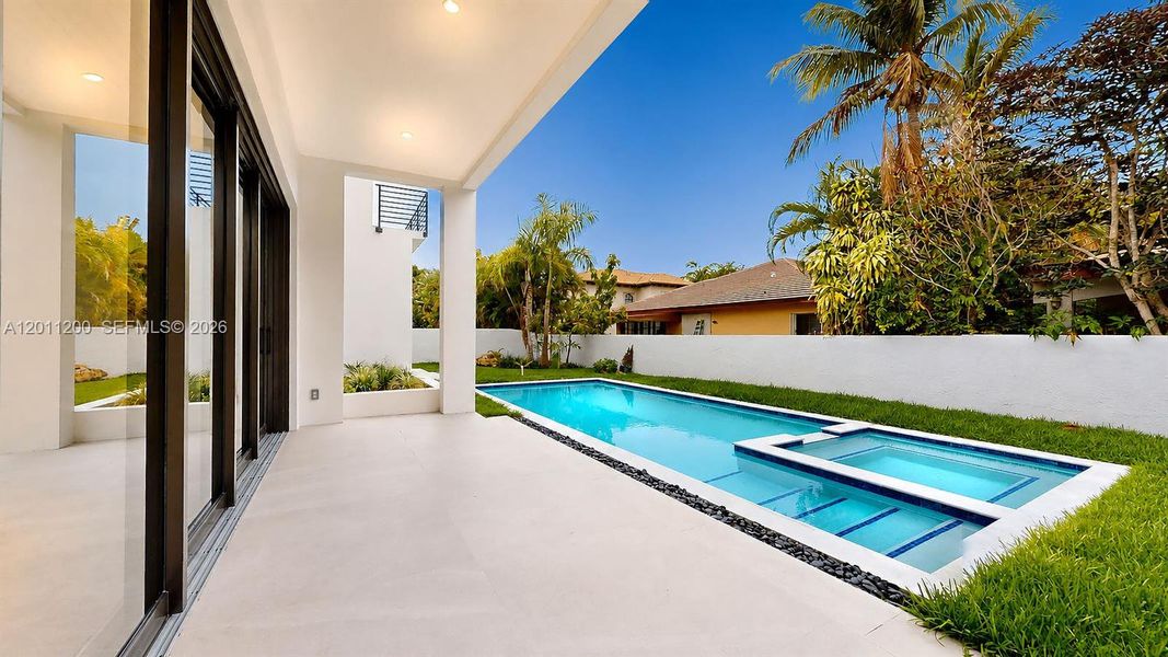 Exterior details and patio area of a home in , Miami Lakes (Image 36).