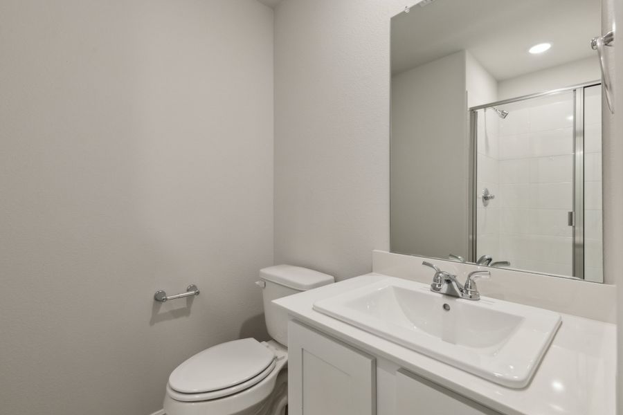 Bathroom in the Hayden home plan by Trophy Signature Homes – REPRESENTATIVE PHOTO