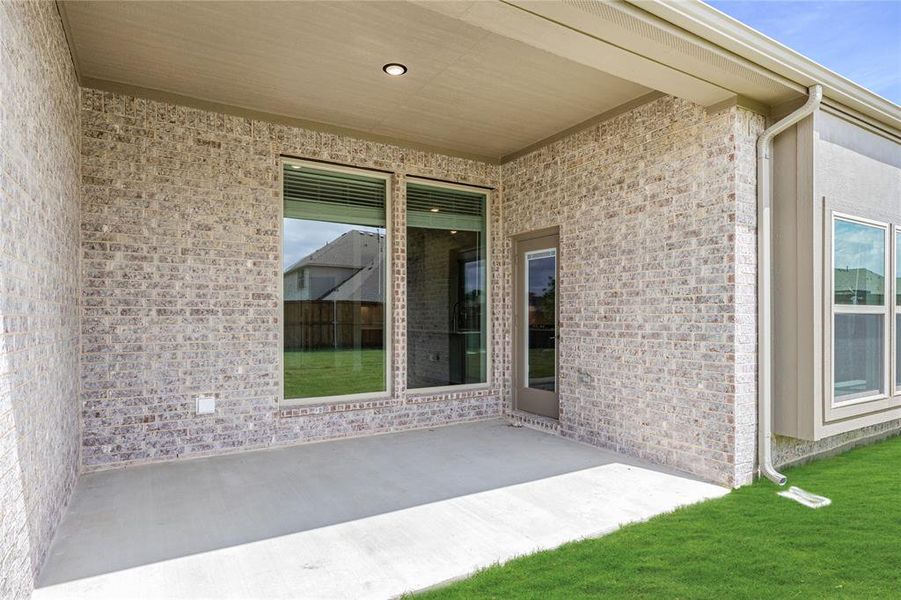 Exterior details and patio area of a home in Liberty, Melissa (Image 3). Exterior details and patio area of a home in Liberty, Melissa (Image 3).