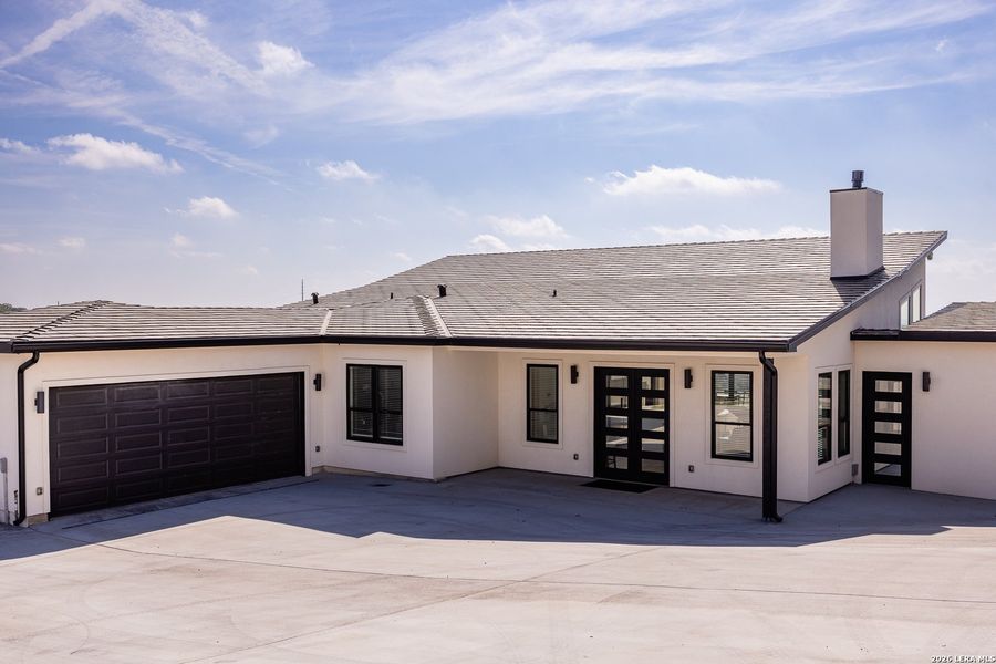 Front exterior of a new home in , Kerrville, TX, highlighting curb appeal (Image 25).