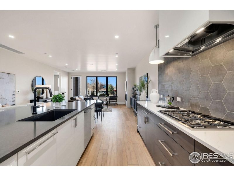 Stylish yet functional kitchen with quartz countertops, European cabinets and Thermador appliances