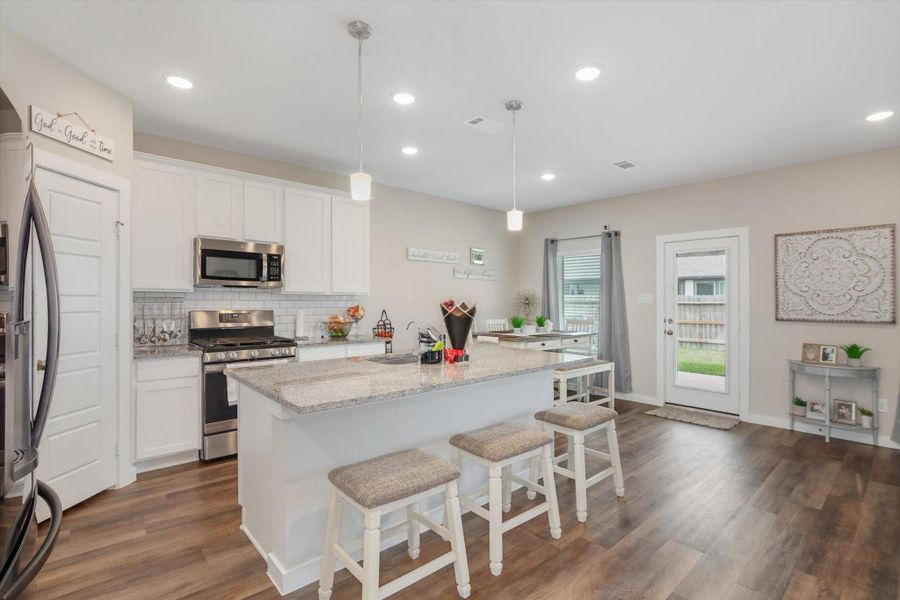Furnished interior view inside a new home in Marvida, Cypress (Image 8).