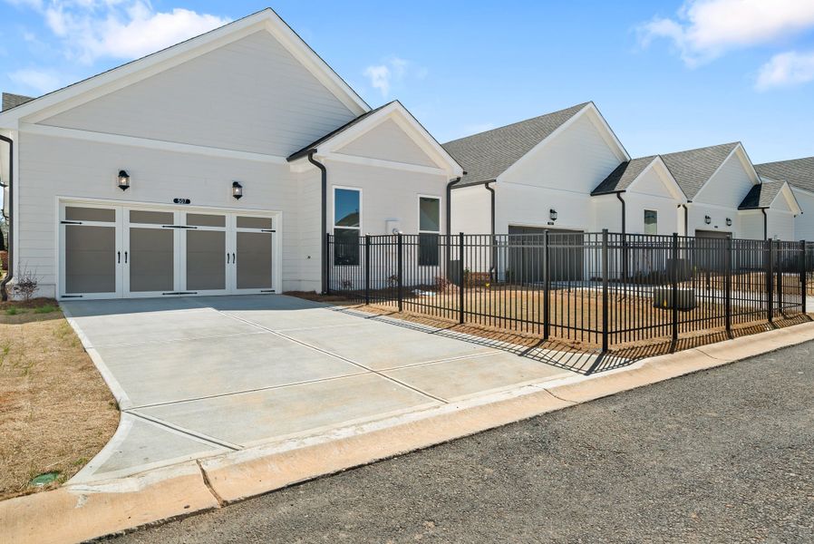 Representative exterior photo of a completed home built from the The Henley by The Providence Group in Promenade at Sawnee Village, Cumming, GA (Image 21). Representative exterior photo of a completed home built from the The Henley by The Providence Group in Promenade at Sawnee Village, Cumming, GA (Image 21).