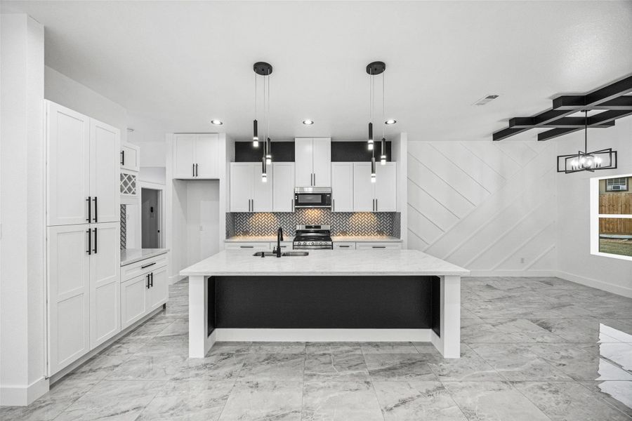 Furnished interior view inside a new home in , Conroe (Image 3).