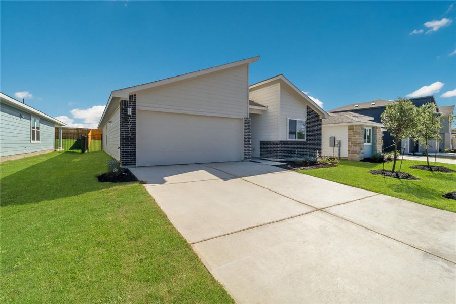 Front exterior of a new home in Trails at Wildhorse, Austin, TX, highlighting curb appeal (Image 2).