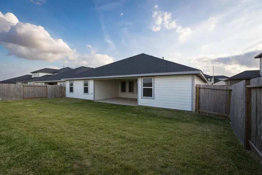 Exterior details and patio area of a home in , Fulshear (Image 24).