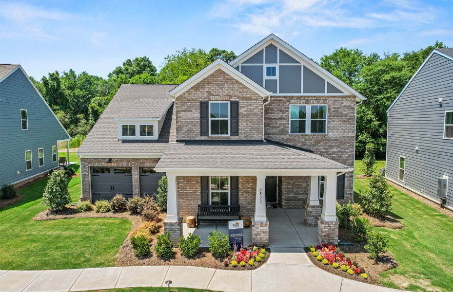 Front exterior of a new home in Riverstone, Monroe, NC, highlighting curb appeal (Image 1). Front exterior of a new home in Riverstone, Monroe, NC, highlighting curb appeal (Image 1).