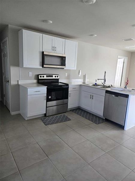 Furnished interior view inside a new home in , Labelle (Image 3).