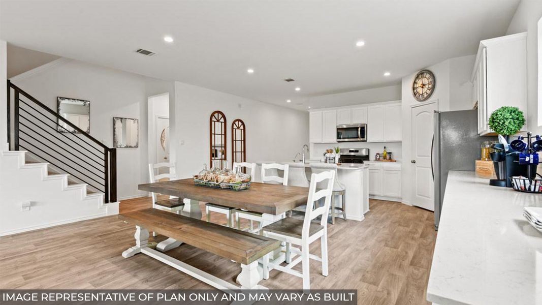 Furnished interior view inside a new home in Sunterra, Katy (Image 10).