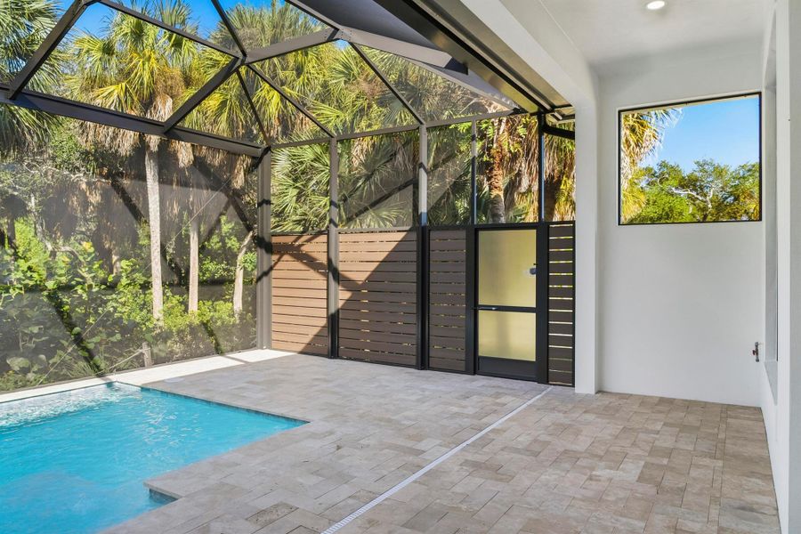 Exterior details and patio area of a home in Seaglass, Wabasso Beach (Image 31).