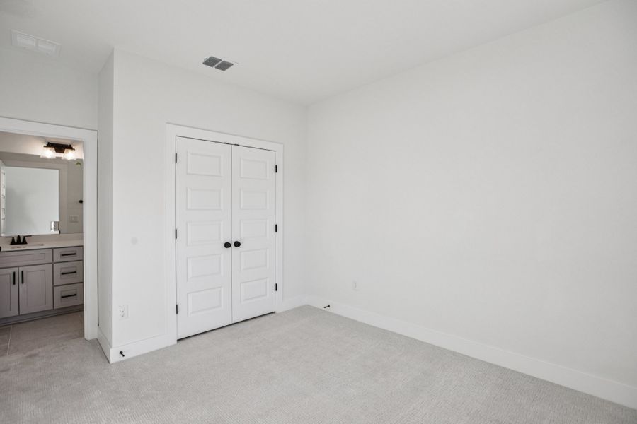 Spacious, unfurnished interior of a new home in Koenig Townhomes, Austin (Image 22).