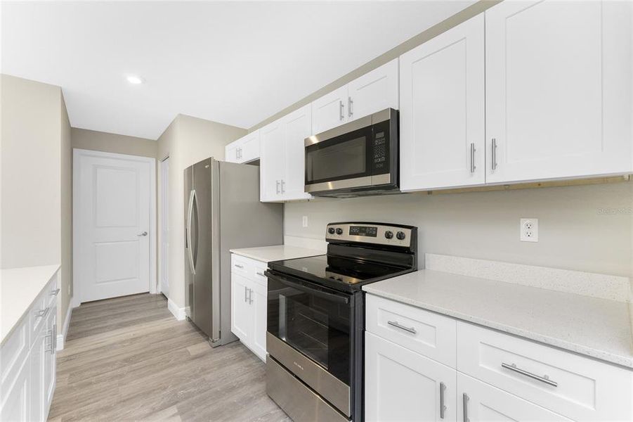 Furnished interior view inside a new home in , North Port (Image 14).