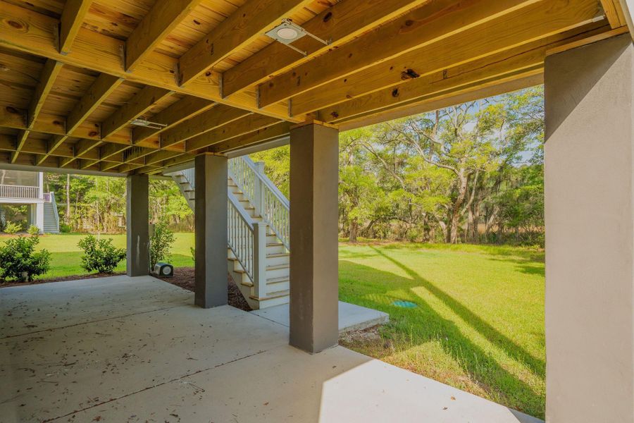 Exterior details and patio area of a home in , Johns Island (Image 32).