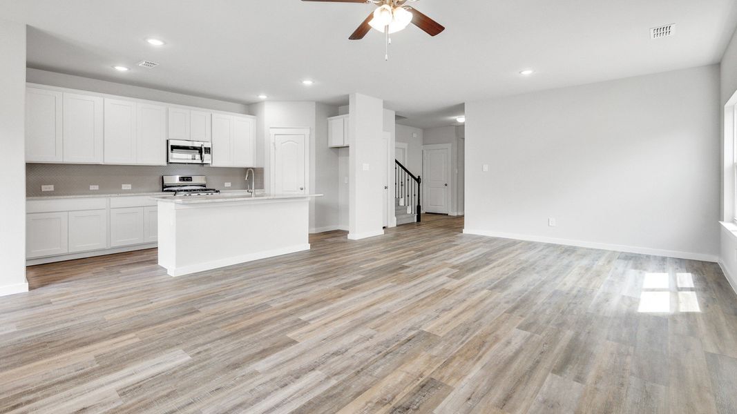 Representative furnished interior of a home built from the Meyerson by Brightland Homes in Sunterra, Katy (Image 8).