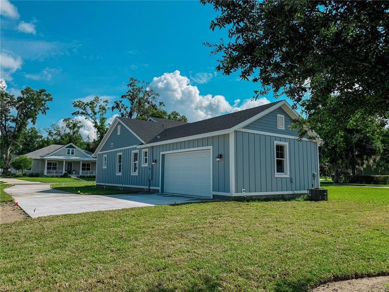 Front exterior of a new home in , Lake Helen, FL, highlighting curb appeal (Image 36). Front exterior of a new home in , Lake Helen, FL, highlighting curb appeal (Image 36).