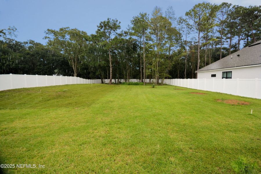 Front exterior of a new home in , Fernandina Beach, FL, highlighting curb appeal (Image 22).